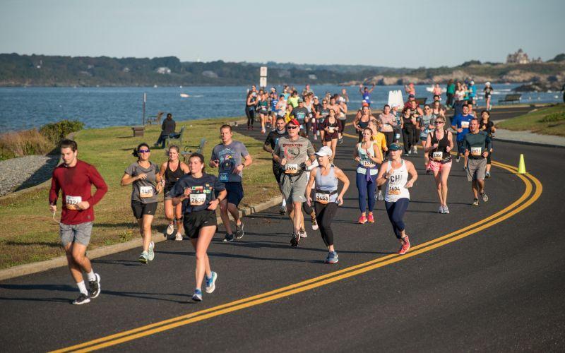 Newport Marathon runners on the seafront