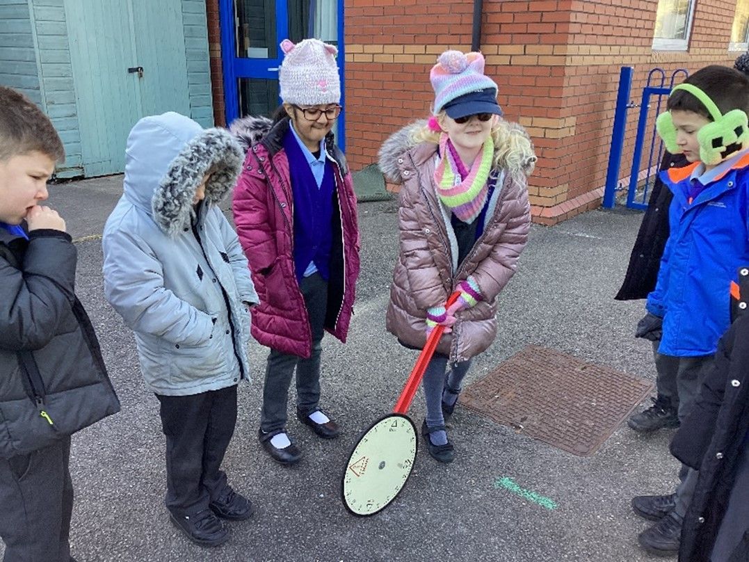 Dinas Powys Primary School - Children from Year 2 measuring the distance for The Daily Mile.jpg