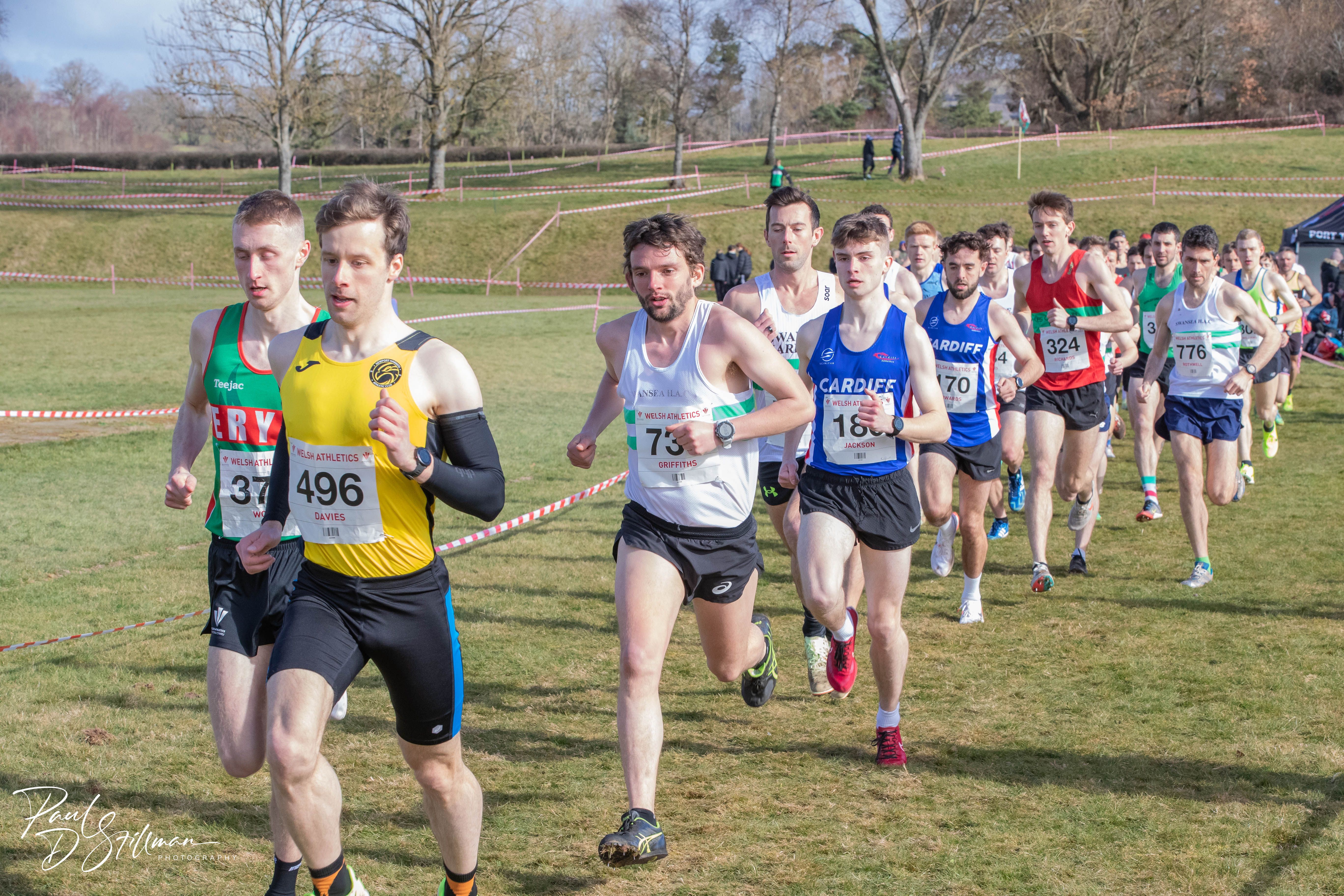 Runners taking part in the senior men's race at the 2023 Welsh Cross Country Championships.