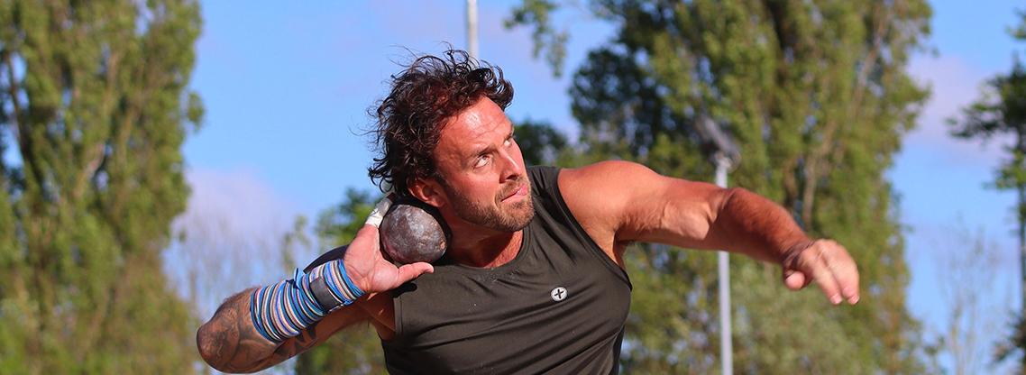 Aled Davies throwing a shot put at Run with the Wind 2023