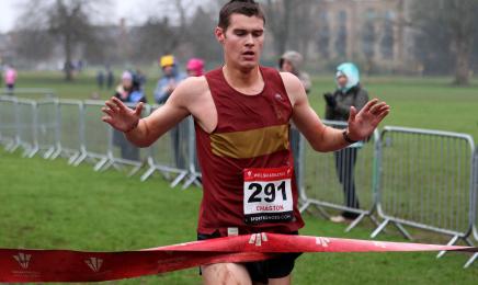 Thomas Chaston takes the tape to win the senior men's title..jpg