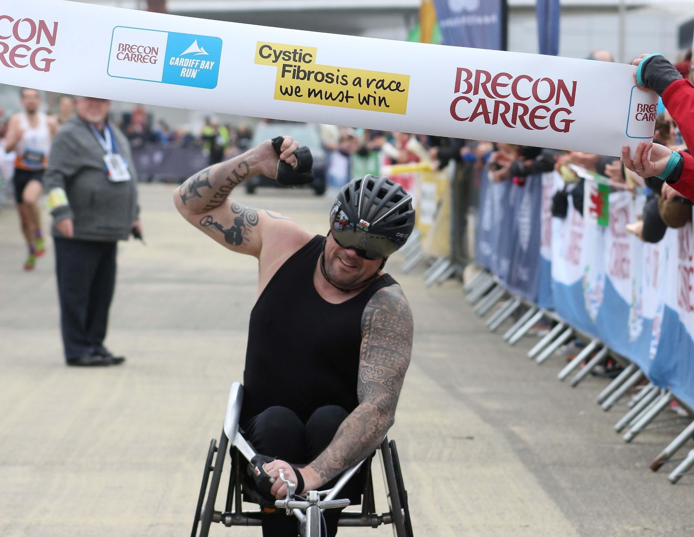 Richie Powell celebrates his win in the wheelchair race..jpg